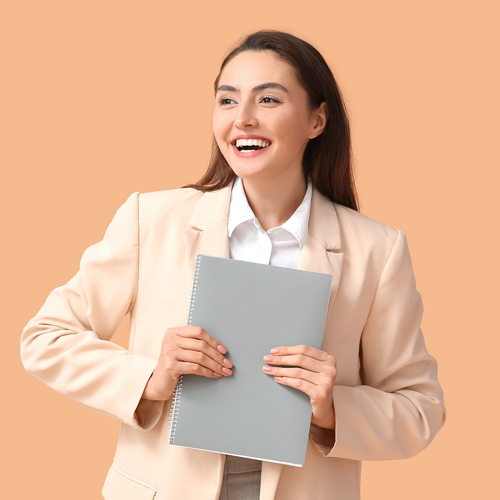A woman holding documents