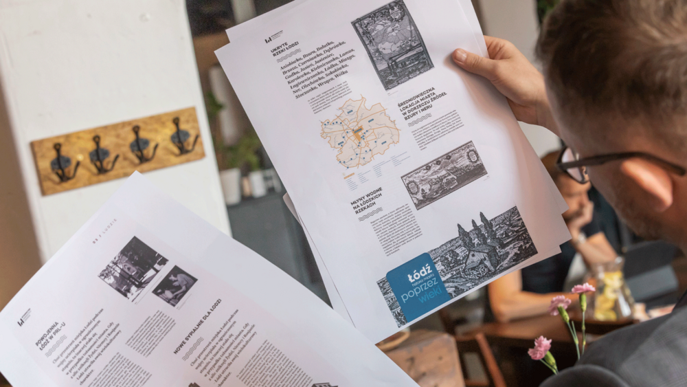 A graphic with a printout of photos of architectural objects from Lodz