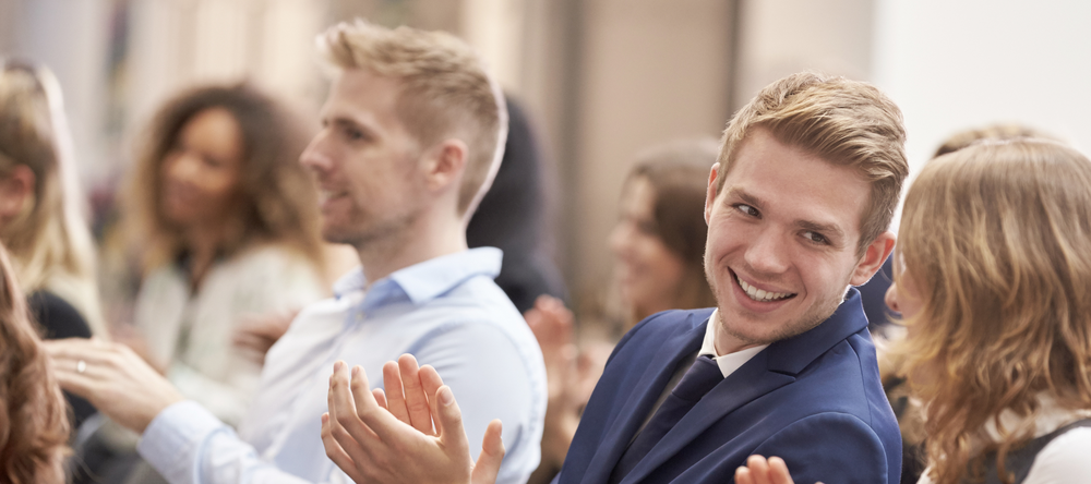 Young people applauding