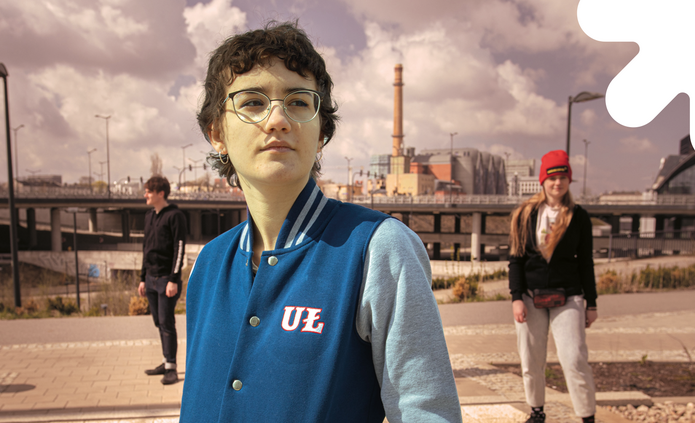 Students against the background of the city of Łódź