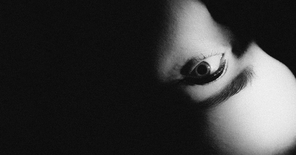 A photo of an eye on a black background